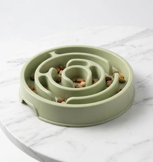 gamelle anti glouton vert classique sur une table en marbre